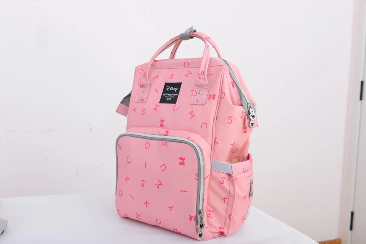 Mochila de gran apertura con flamencos en rosa o azul claro · vista 1