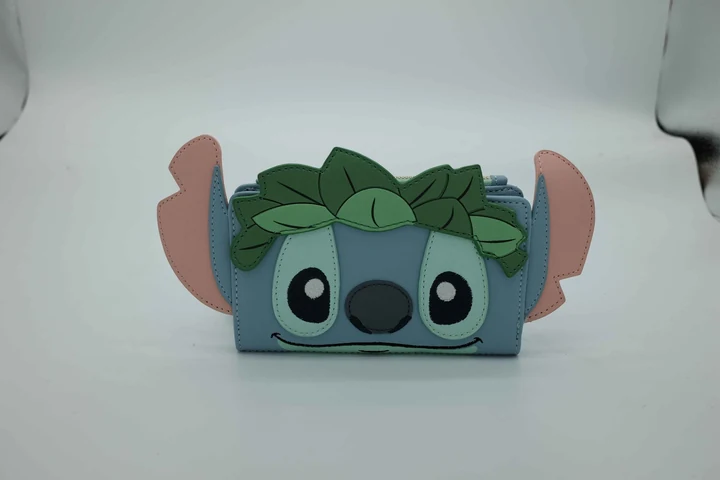 Disney Stitch Leaf-Front Zip Wallet with Raised Character Face, Green Leaf Panels, Plain Blue Rear and Divided Interior · view 1