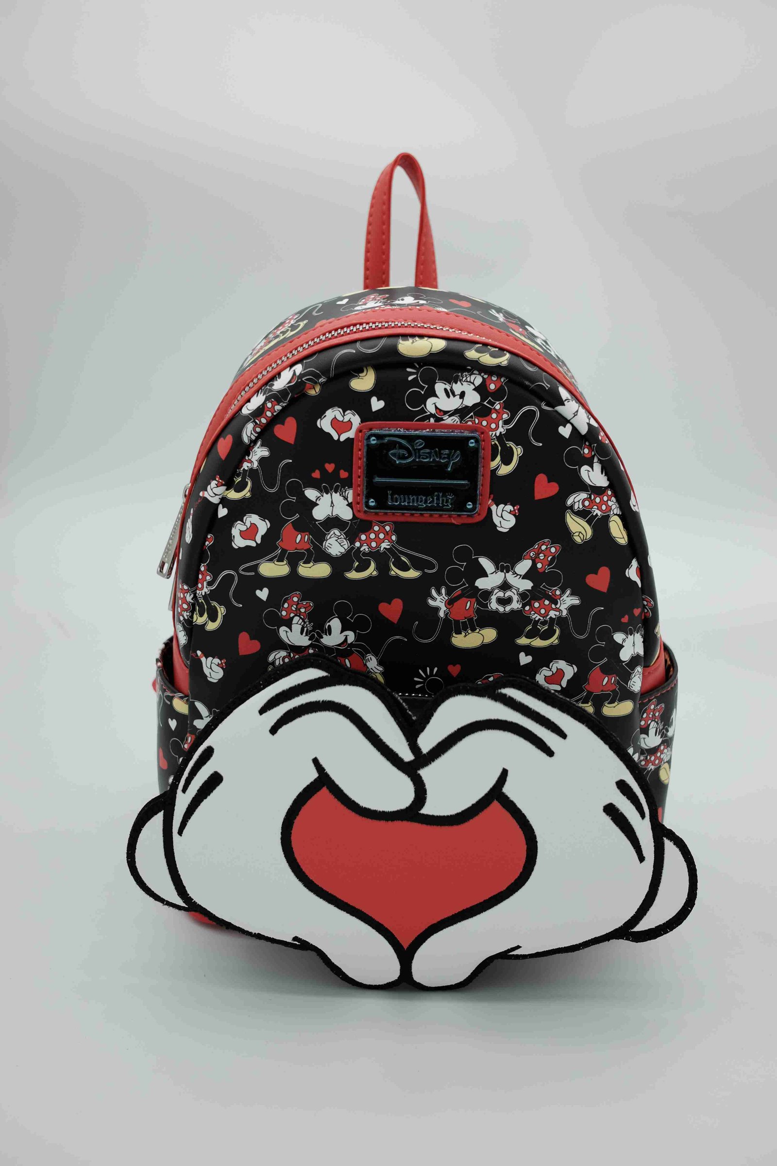Disney Mickey Black and Red Character Backpack with Heart-Shaped Hand Artwork, Side Pocket and Printed Interior · enlarged view 1